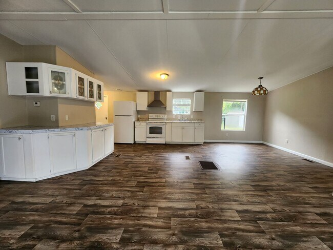 Building Photo - 3 bed, 2 bath w/ Front & Back Decks, 1/4 Acre of land, FENCED backyard