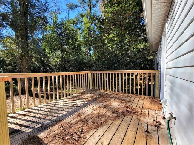 Building Photo - 2 bedroom duplex for rent right away off E Mahan, wood floors and fireplace for $1450 per month