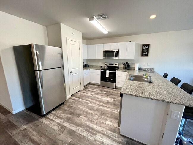 Building Photo - New 4 Bedroom Home in Bullhead City! AVAIL...