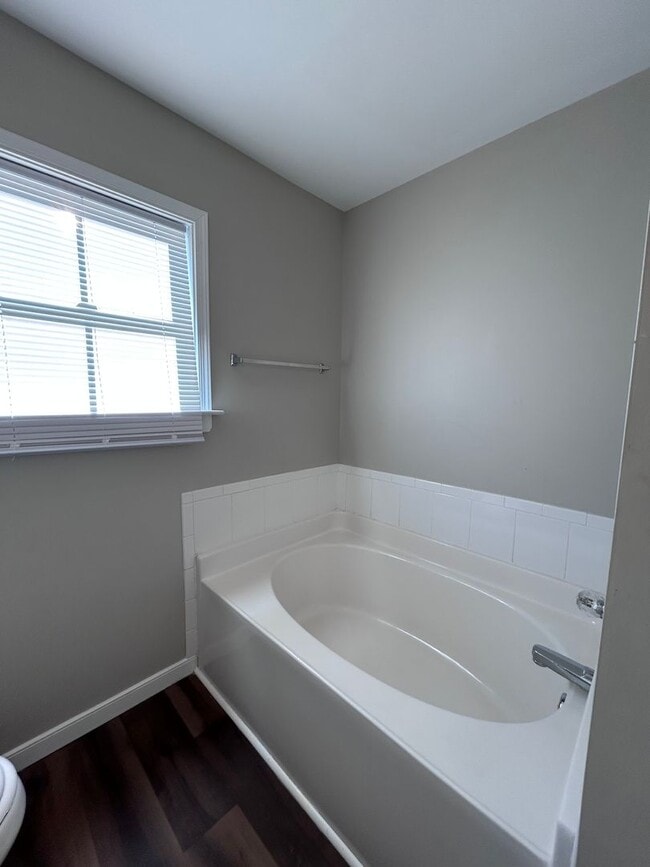 Building Photo - Available Now! | Spacious 4-Bedroom Home |...