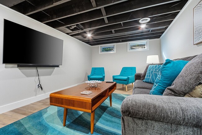 Building Photo - FURNISHED RENTAL: New Mid-Century Mod on M...