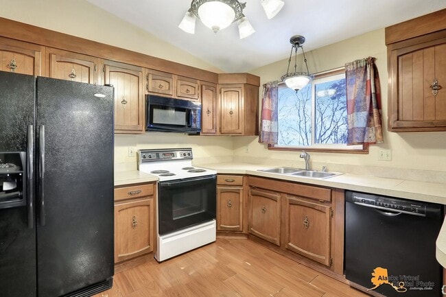 Building Photo - Spacious Home with Garage & Fenced Yard Near JBER & Major Hospitals