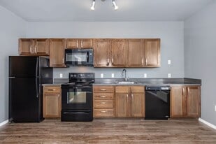 Building Photo - The Falcon of Southern Hills Apartments