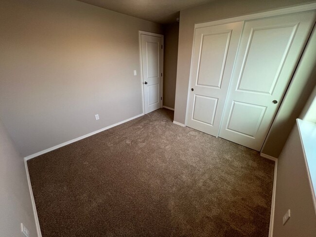 Building Photo - NEW Modern Townhouse with Two Car Garage i...