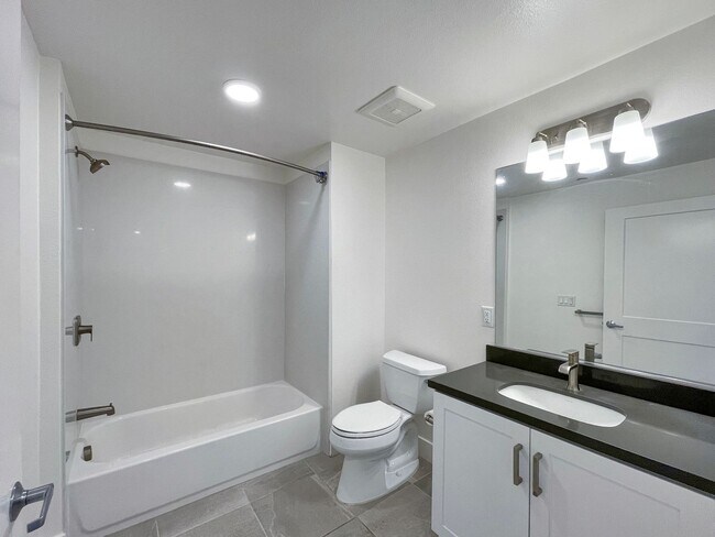 Building Photo - Modern 2BD Fremont Condo – EV Charger, Bal...