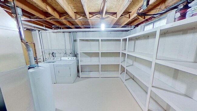 Building Photo - Updated 2BR/1BA duplex with office in partially finished basement, detached garage and across fro...