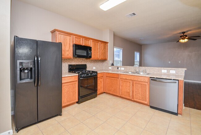Building Photo - 10806 Woodwind Shadows Dr