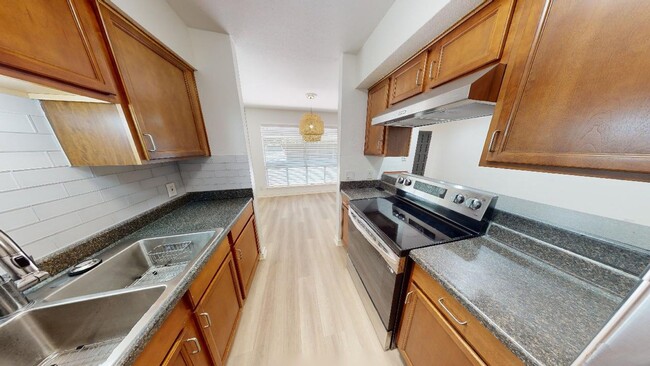 Building Photo - Gorgeous Condo nestled right on Lady Bird ...