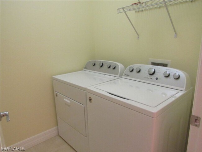 Building Photo - For Lease – Spacious 4-Bedroom Coach Home in Avalon Preserve