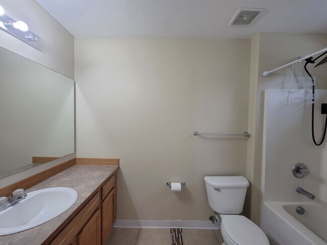 Building Photo - Comfortable 4-Bedroom Home with Fenced Bac...