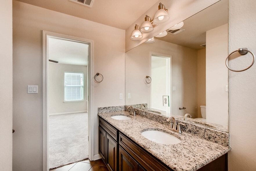 Upgraded double vanity in the master bedroom! - 1813 Carlson Drive