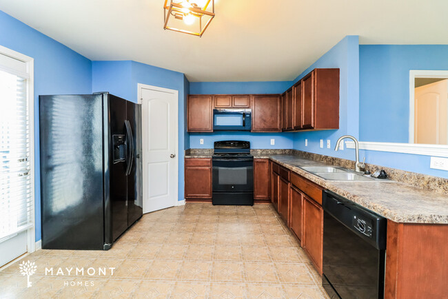 Building Photo - End-Unit 3-Bedroom Townhome