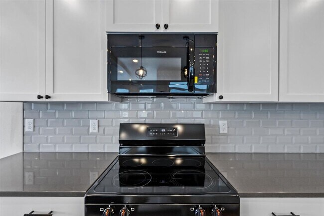 Building Photo - Brand New, Stylish 4-Bedroom Home with Vaulted Ceilings and Private Patio