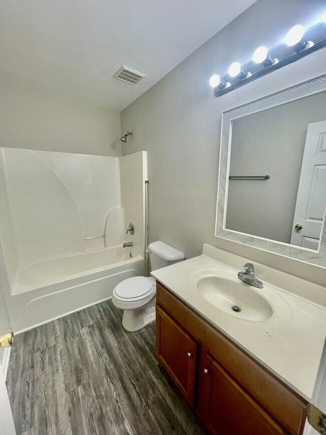 Building Photo - Come take a look at the gorgeous newly renovated 4 bedroom, 2.5 bath, 2 car garage home located i...