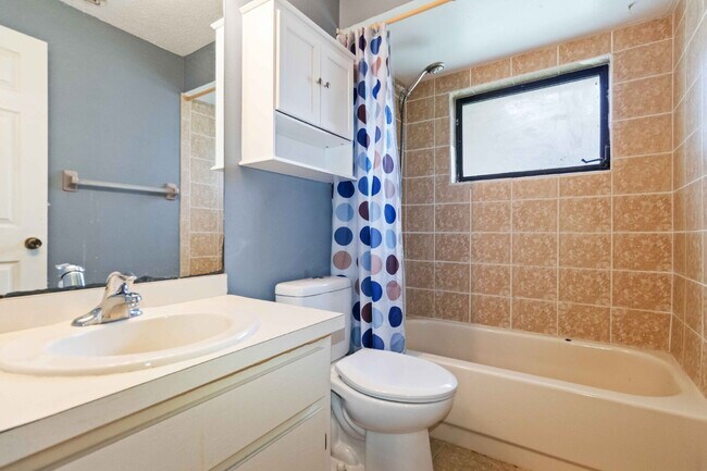 Building Photo - "Charming 2-Bedroom Duplex in Port Charlot...