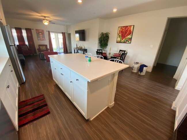 Building Photo - Welcome to the Best Deal in Town. Fully furnished 4 BD 2 BA house on a corner lot