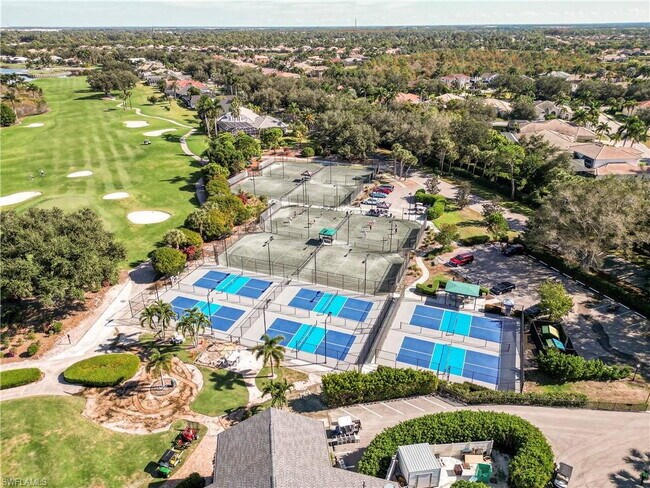 Building Photo - Turnkey 2-bedroom plus den villa, perfectly situated to capture stunning golf course and lake vie...