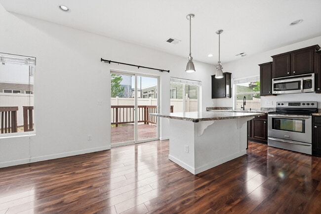 Building Photo - $2,245.95, 2 bed, 2.5 bath located in Denver with a fenced yard.