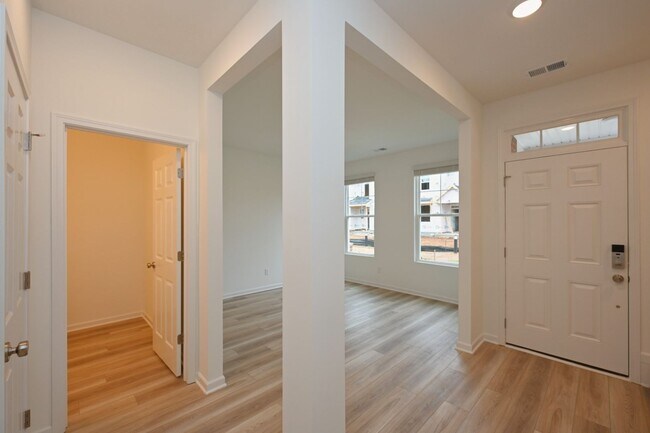 Building Photo - **BE THE LUCKY ONE TO LIVE IN THIS 2024-BUILT BRICK TOWNHOME IN THE VILLAS AT REGAL SQUARE FEATUR...
