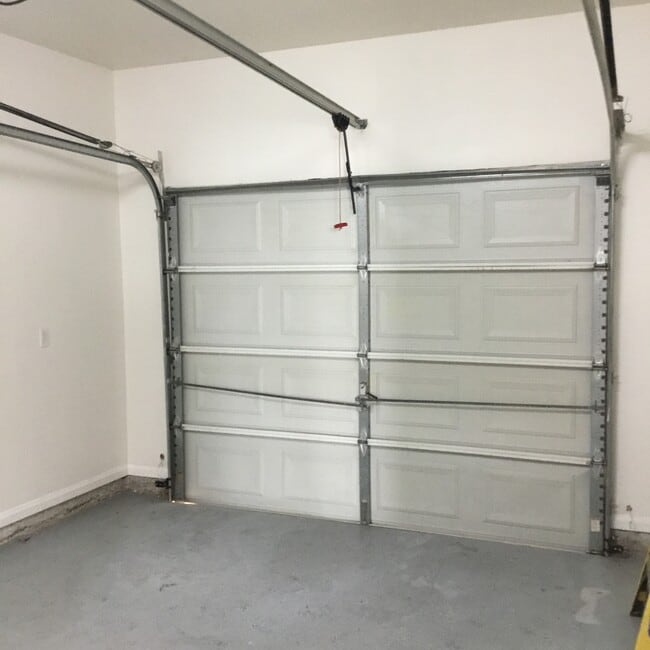 Auto Garage Door - 2909 Whisper Oaks Ln