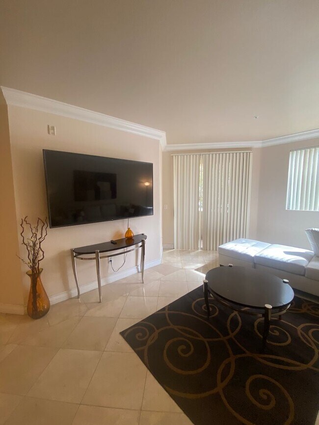 Building Photo - Long or short term available!  Live in lux...