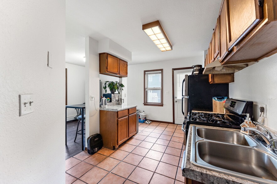 Kitchen with dining space - 3101 E 24th St