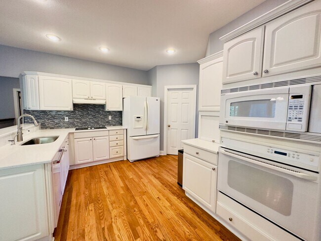 Building Photo - {6411} Enchanted Lake Estates + Updated Kitchen, Fresh Paint Throughout +  Main Floor Primary Bed...