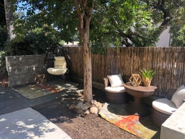 Building Photo - Stunning Duplex with Wrap Around Deck - Available Now