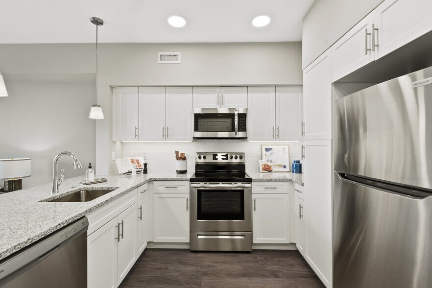 Building Photo - Avenida at Centerra 55+ Active Adult Apartment Homes