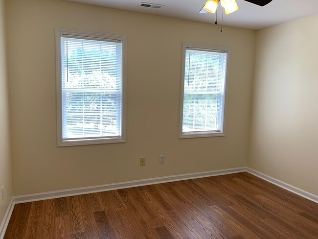 Building Photo - SPACIOUS HOME WITH DOWNSTAIRS PRIMARY BEDROOM AND BATH- LAKE WHEELER/ FARMER'S MARKET AREA