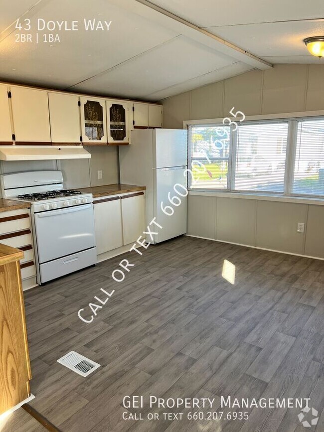 Building Photo - Cozy updated 2 bedroom home! Home Warranty...