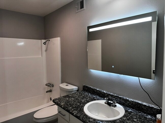 Building Photo - Charming 2-Bedroom Condo with Fireplace & ...