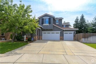 Building Photo - Beautiful & Spacious 4-Bedroom, 3-Bath Hom...