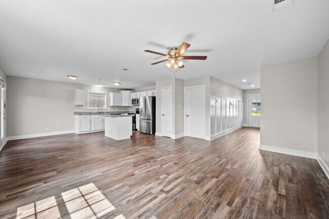 Building Photo - Beautiful Open-Concept Home with Covered Deck & Huge Backyard