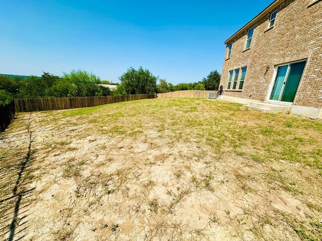 Building Photo - Your Dream Awaits! A Charming 4 bedroom 2....