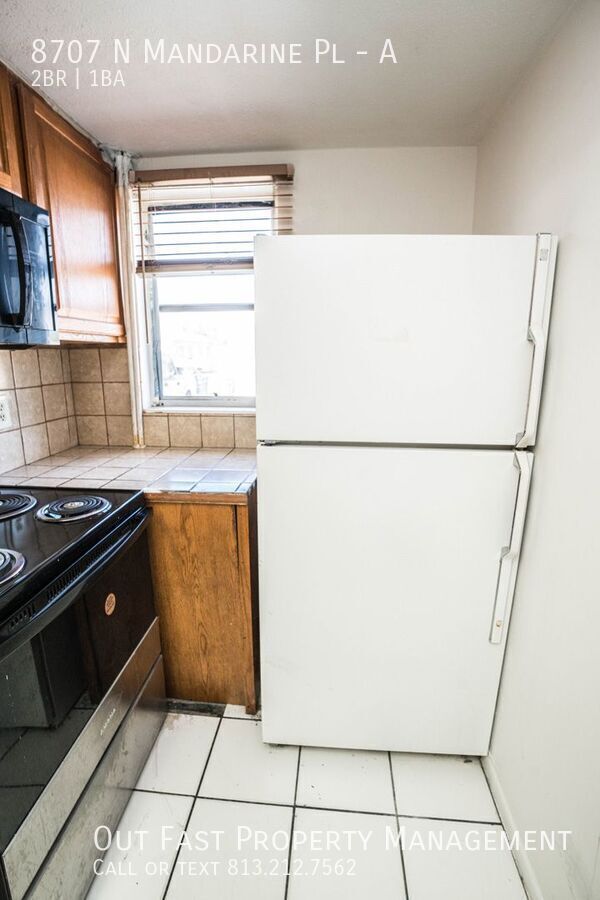 Building Photo - Spacious 2BR/1BA Duplex in Tampa – Pet Fri...