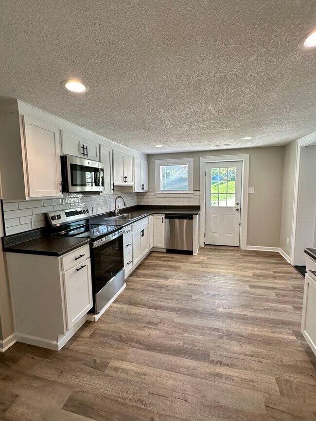 In cabinet double trash cans, lazy susan - 2304 Belle Ave NE