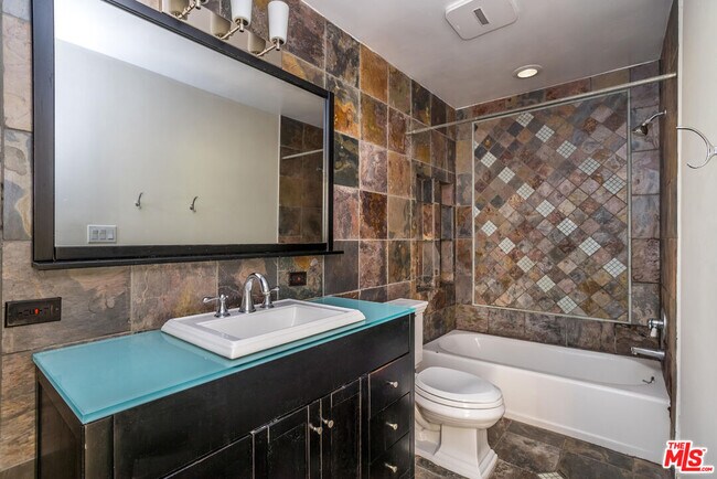 Building Photo - 1230 N Sweetzer Ave