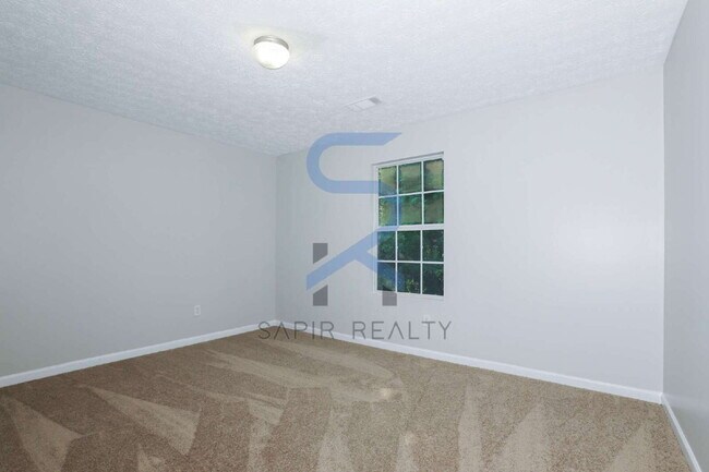 Building Photo - Modern All-Electric Living – 3BR Retreat with 2 Full Baths in Griffin