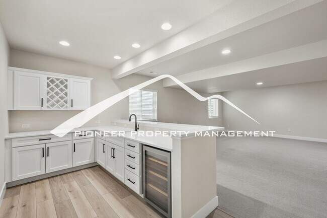 Building Photo - Main Floor Primary Home in Flying Horse with 5 Bedrooms, Gourmet Kitchen, Finished Basement & 4-C...