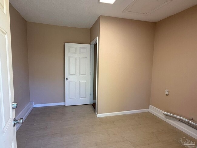 Building Photo - 7845 Le Jeune Dr