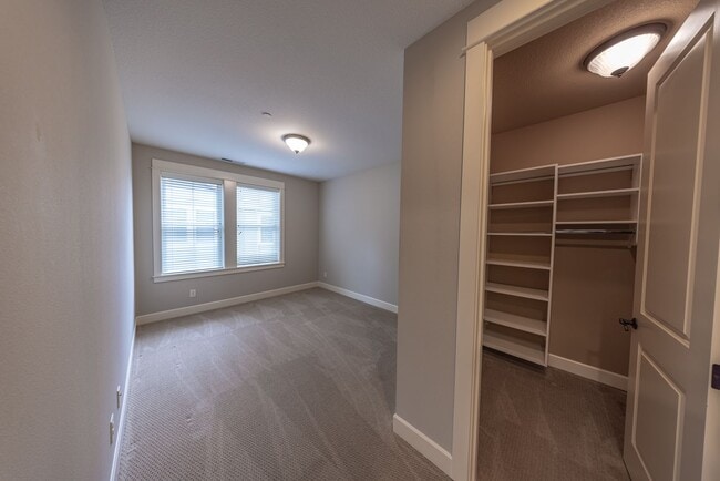 Building Photo - 2 Creeks Condominiums - Gated Community on...