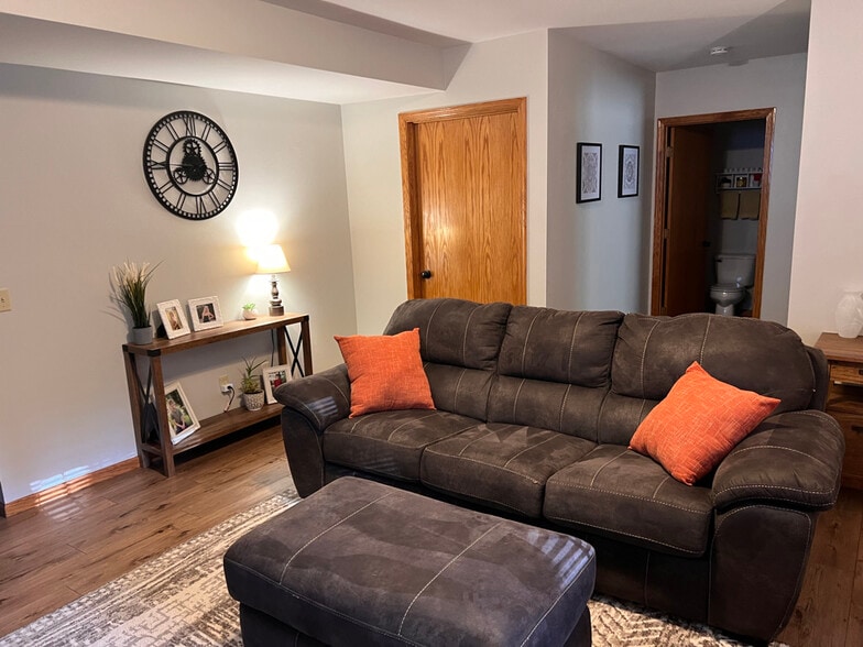 lower level family room w/ view of 1/2 bath - 824 N Clover Ln