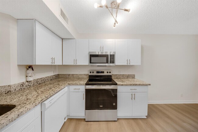 Building Photo - 8977 Wiles Rd