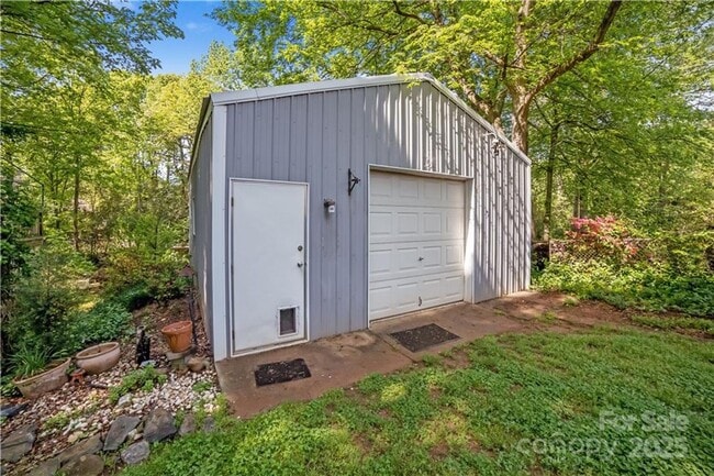 Building Photo - Ranch with Fence and 20x30 Garage/Workshop with Electric Close to Light Rail