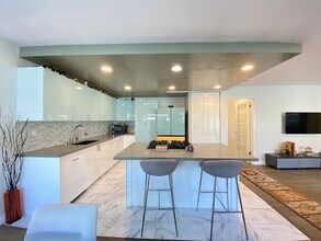 Building Photo - Stunning 3-bedroom, 2-bathroom coastal condo with Modern Custom Upgrades!