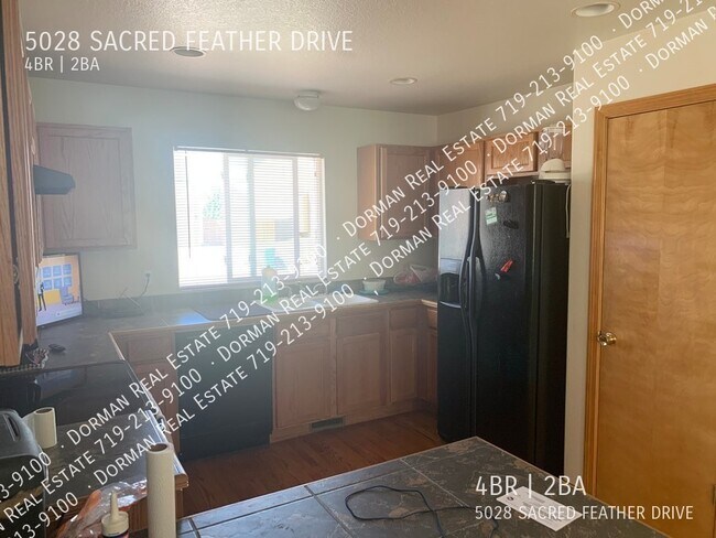 Building Photo - 5028 Sacred Feather Dr