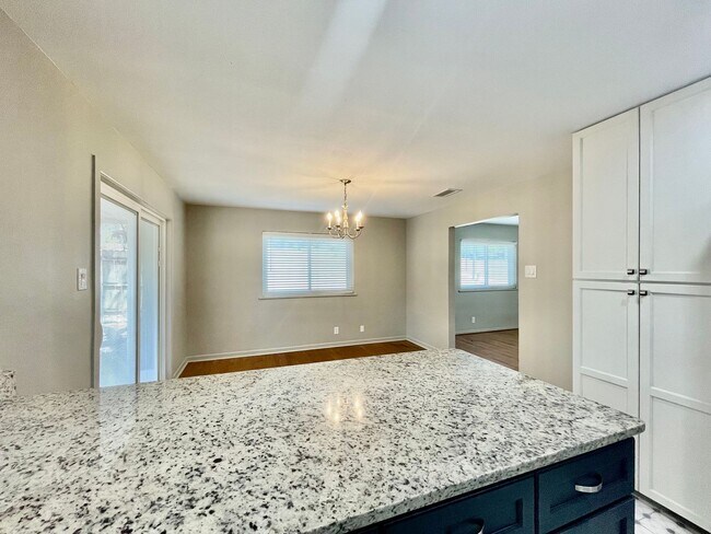Building Photo - Updated Home w/ 2 Car Garage, Backyard and...