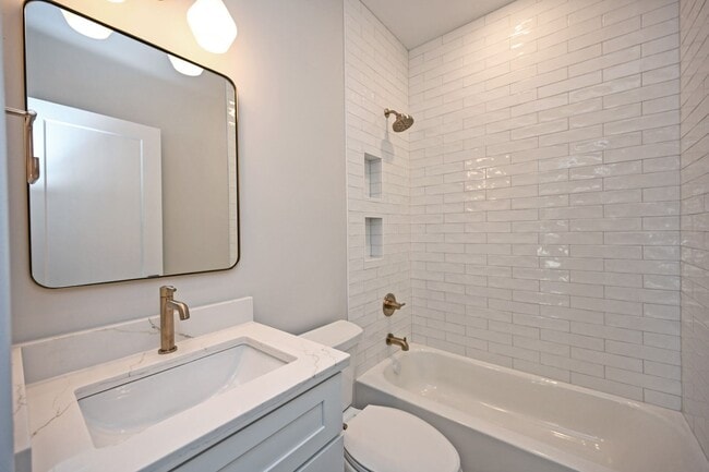 Building Photo - Stylish, Sustainable & Low-Maintenance Liv...