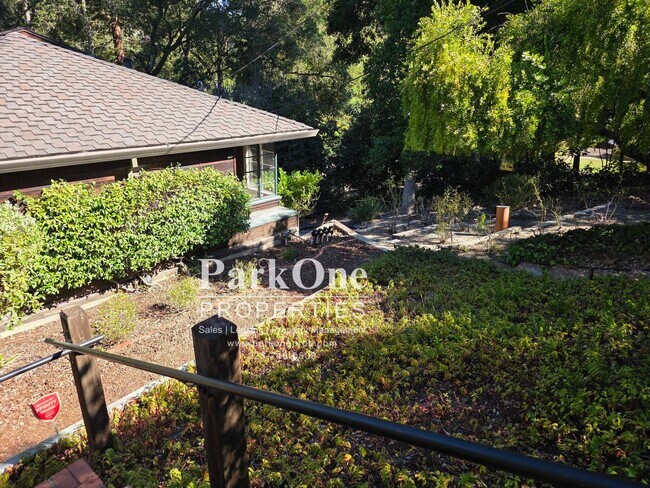 Building Photo - Spacious Home on a Private Wooded Lot Now Available!